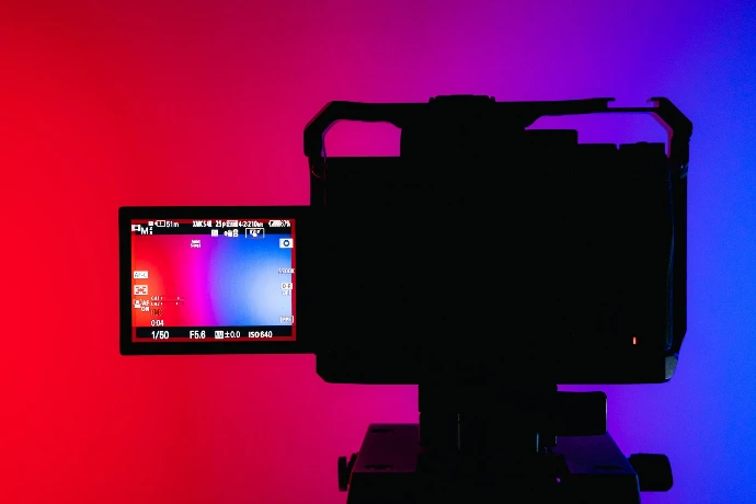A camera and a monitor in a room